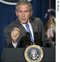 President Bush gestures during a news conference in Crawford, Texas, 7 August 2006