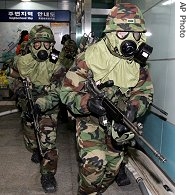 S. Korean soldiers participate in joint military exercise, Ulchi Focus Lens, at subway station in Seoul, Aug. 17, 2006