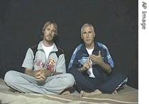 Image taken from video released by kidnappers Wednesday Aug. 23, 2006, shows American journalist Steve Centanni, right, and New Zealand cameraman Olaf Wiig as they make a statement while in captivity
