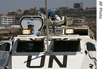 An Indian unit from UNIFIL patrols a road near southern border town of Taibe, Lebanon, Aug. 23, 2006