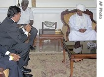 Bill Richardson, left, and President Omar Bashir, right, during negotiations to release Paul Salopek and two Chadians jailed on charges of espionage in Khartoum, Sept. 8, 2006