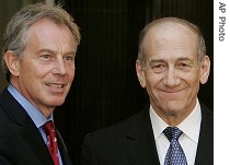 Israeli Prime Minister Ehud Olmert, right, and British Prime Minister Tony Blair are seen during a joint news conference at the Prime Minister's residence in Jerusalem