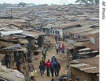 Kenyans make their way through narrow streets in the Kibera slum in Nairobi (2005 file photo) 