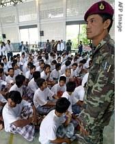 Thai Muslim detainees in Tak Bai Province wait for their release in this 2004 file photo 