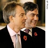 Britain's PM Tony Blair, left, arrives with Chancellor of the Exchequer Gordon Brown for the release of Stern report   