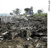 The wreckage of the ADC airliner is seen after crashing in Abuja, October 29, 2006