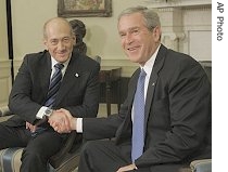 President Bush shakes hands with Israeli PM Ehud Olmert in Oval Office of the White House, Nov. 13, 2006