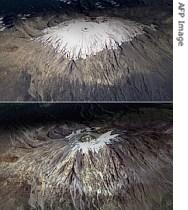 In one visible example of cliamte change in east Aftica, combo satellite images show two perspective views of Tanzania's Mount Kilimanjaro on Feb. 17, 1993 (top) and Feb. 21, 2000 (bottom)