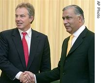 British PM Tony Blair, left, shakes hands with his Pakistani counterpart Shaukat Aziz in Islamabad, Pakistan, November 19, 2006