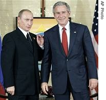 President Bush, President  Putin, after they made statements regarding a US-Russia agreement in Hanoi, November 19, 2006