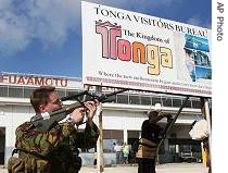 New Zealand soldiers patrol grounds of Fua'amotu Airport upon their arrival to Nuku'alofa, Tonga, Nov. 18, 2006