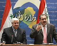 Syria's Foreign Minister Walid Moallem, left, listens as Iraq's Foreign Affairs Minister Hoshyar Zebari talks during a media conference in Baghdad Tuesday, November 21, 2006