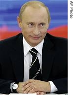 Russian President Vladimir Putin smiles during a nationally televised question-and-answer session in Moscow, October 25, 2006