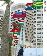 Flags of EU, AU participating states in the immigration and development conference wave in Tripoli, 23 Nov. 2006