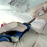 A laboratory technician prepares samples for DNA testing