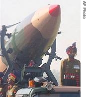 Indian Army soldier stands next to a Prithvi missile on display during a parade, 13 Jan 2006 