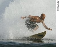 Ali Zeia glides across a wave in Dakar, Senegal