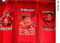 T-shirts with the image of Venezuelan President Hugo Chavez are offered for sale in downtown Caracas