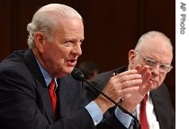 Iraq Study Group Co-Chairmen, former Secretary of State James A. Baker III, left, and former Indiana Rep. Lee Hamilton discuss their Group's report while testifying before the Senate Armed Services Committee