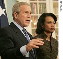 President Bush, left, along with Secretary of State Condoleezza Rice speaks to members of media following their meeting at State Department in Washington, 11 Dec 2006