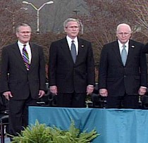 From left, Donald Rumsfeld, President Bush and Vice President Cheney at farewell parade