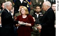 From left: Robert Gates, his wife Becky and Vice-president Dick Cheney 