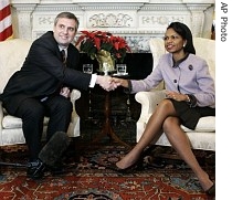 Secretary of State Condoleezza Rice, right, shakes hands with Bulgarian Foreign Minister Ivailo Kalfin at the State Department in Washington
