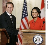 Secretary of State Condoleezza Rice, right, and Canadian Foreign Minister Peter MacKay shake hands