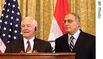Defense Secretary Robert Gates, left, and Iraqi Defense Minister Abdul Qadir during their meeting in Baghdad, 21 Dec. 2006