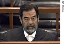 Saddam Hussein sits in court in Baghdad, 19 Dec. 2006