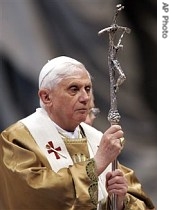 Pope Benedict XVI holds his pastoral staff during the Epiphany Mass in St. Peter's Basilica at the Vatican