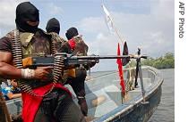 Nigerian separatist rebel brandishes his weapon in a show of strength for reporters <br/> (File photo)