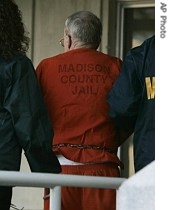 James Ford Seale, 71, a reputed Ku Klux Klansman, is escorted into the federal courthouse by marshals in Jackson, Mississippi