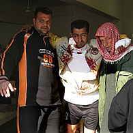 A wounded man is treated in al-Kindi hospital in Baghdad after being hurt in an explosion at animal market, 26 Jan 2007