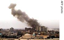 Smoke billows from the site of an explosion in central Baghdad late 03 Feb 2007 