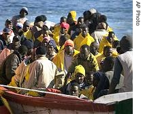 African immigrants arrive in a fishing boat carrying 60 to the port of Los Cristianos, in the Canary island of Tenerife, Spain, 1 Feb 2007