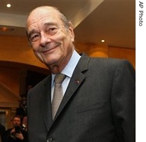 French President Jacques Chirac talks with the photographers at the Sofitel Hotel, February 14, on the eve of the Africa-France summit