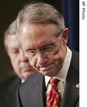Senate Majority Leader Harry Reid lowers his head during a press conference at the U.S. Capitol Saturday