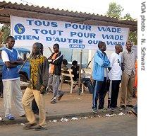 Signs for President Abdoulaye Wade's campaign are all around Dakar