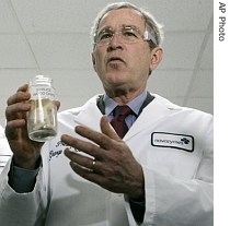President Bush speaks to reporters about how cellulosic ethanol can be produced from bio mass such as spruce wood chips