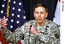 U.S. army Gen. David Petraeus gestures as he speaks during a press conference in Baghdad, 8 March 2007