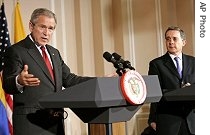 Presidents George W. Bush (l) and Alvaro Uribe during a joint press conference in Bogota, 11 Mar 2007