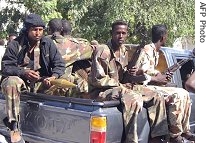 Somali police forces patrolling amid heavy clashes between security forces and suspected Islamist insurgents in Mogadishu, 20 Feb 2007