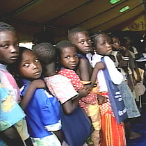 Mozambique schools, children standing in line