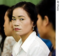 A Cambodian sex worker, second from right, looks on while participating in a group discussion on AIDS in the capital Phnom Penh (File)