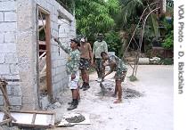 Philippine soldiers constructing a day care center in Manila