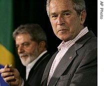 President Bush, right, and Brazil's President Luiz Inacio Lula da Silva attend a joint news conference at Camp David, MD
