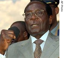 Zimbabwean President Robert Mugabe addresses party supporters at his head office in Harare, 30 Mar 2007