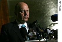 U.S. Deputy Secretary of State John Negroponte talks to reporters during a press conference ending a three day visit to Sudan, in Khartoum, Monday, 16 April 2007