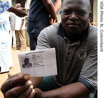 This Lugbe, Nigeria resident has his voting card, but no ballot papers 21 Apr 2007